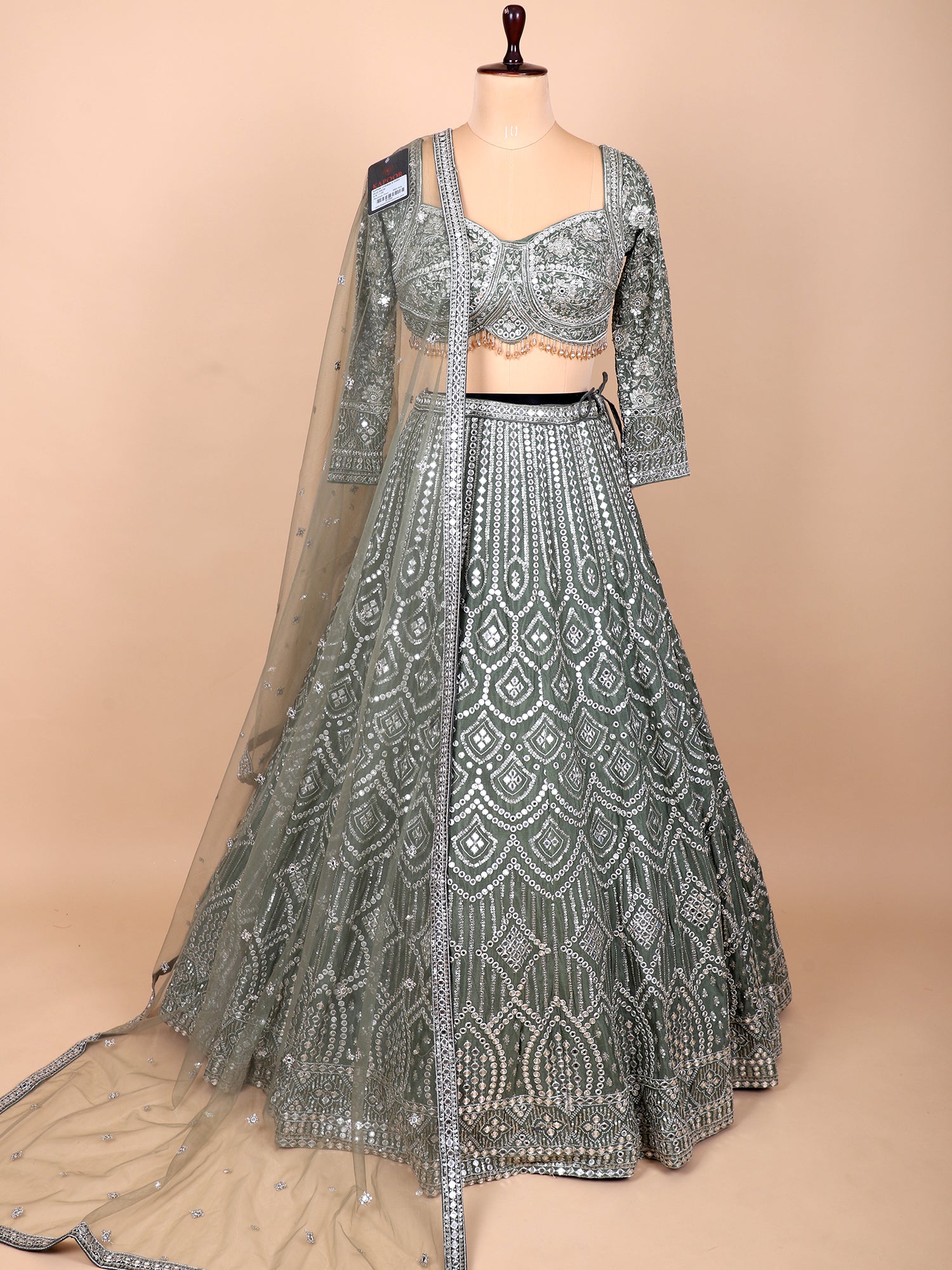 Earthly Charm Mehendi Green Lehenga With Handcrafted Accents