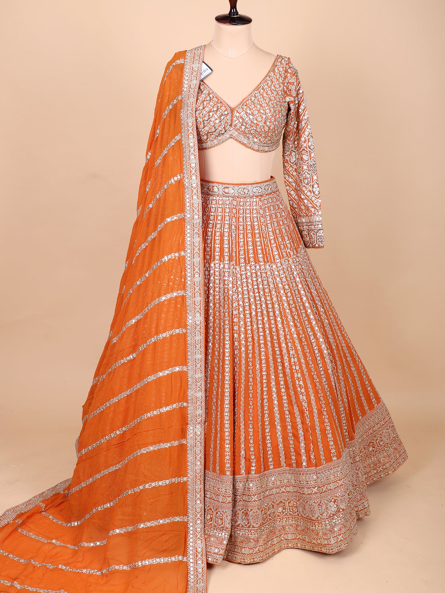 Bright Orange Handcrafted Lehenga Ensemble