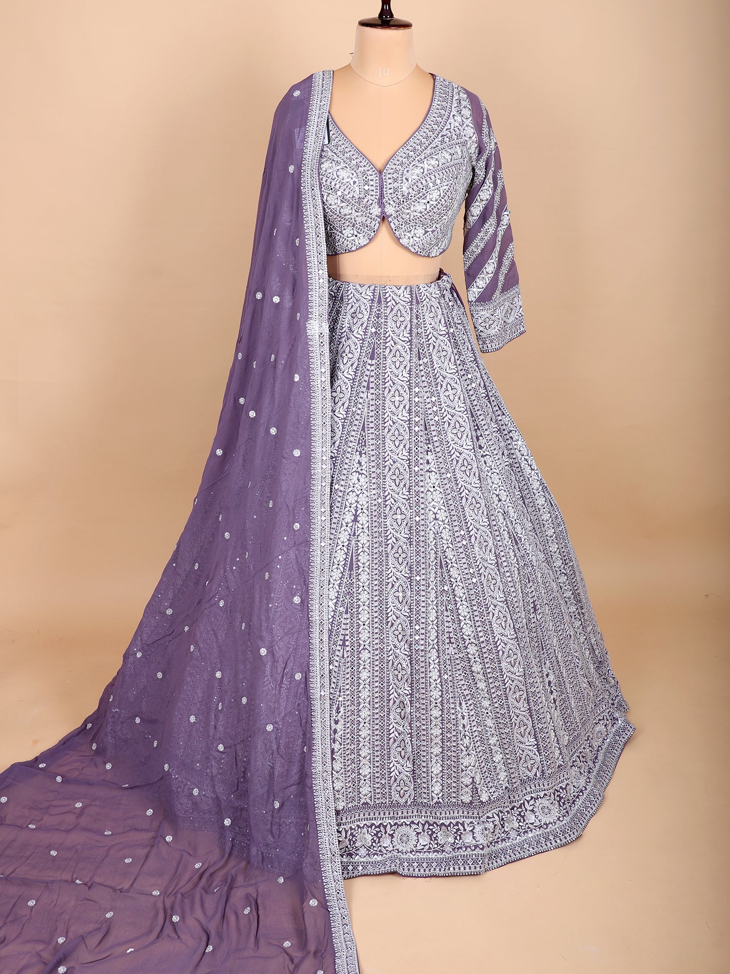 Graceful Lavender Lehenga With Intricate Thread Handwork