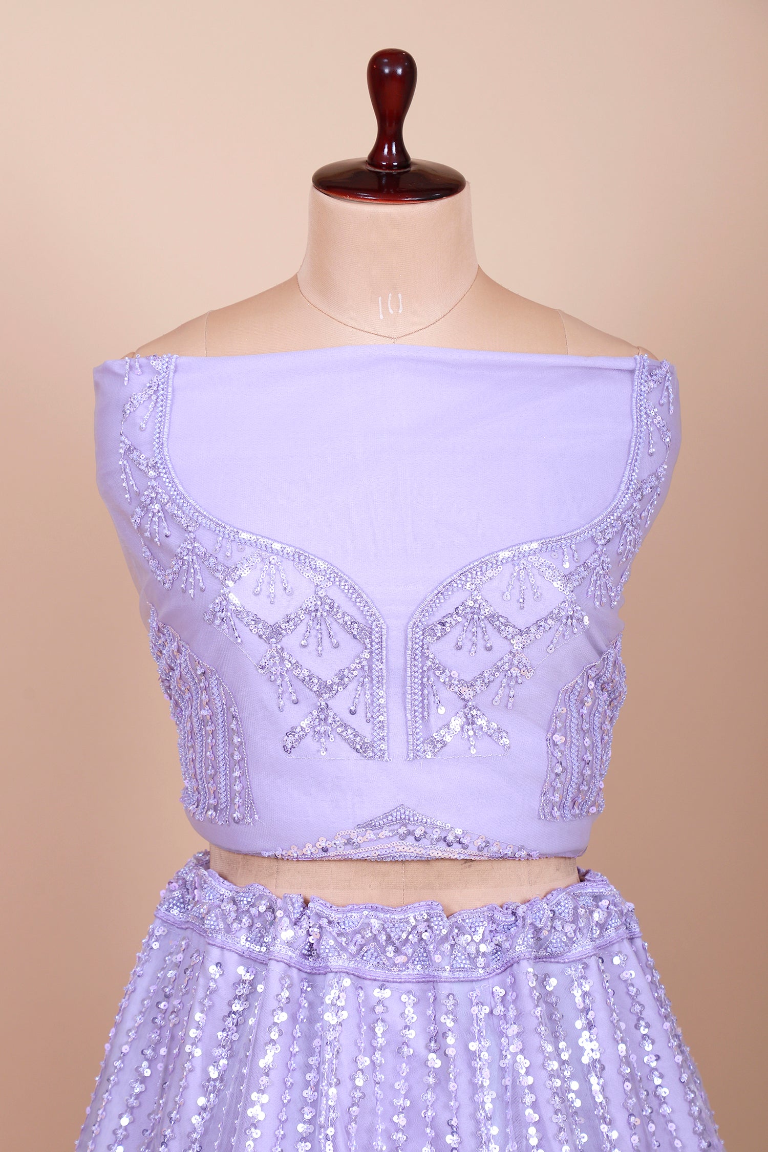 Lavender Net Lehenga With Sequins Detailing