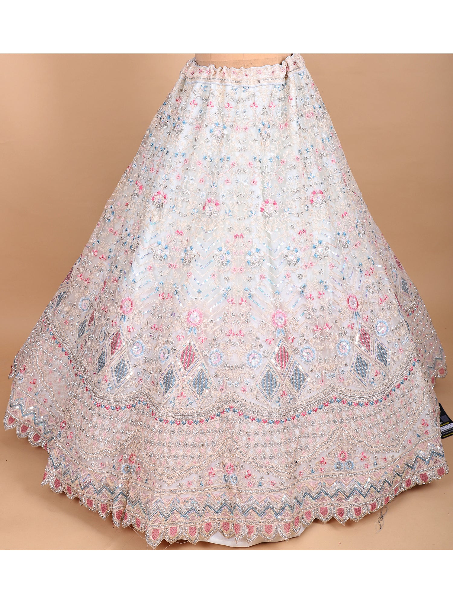 Glow In Grace With Our White Net Jarkan Lehenga