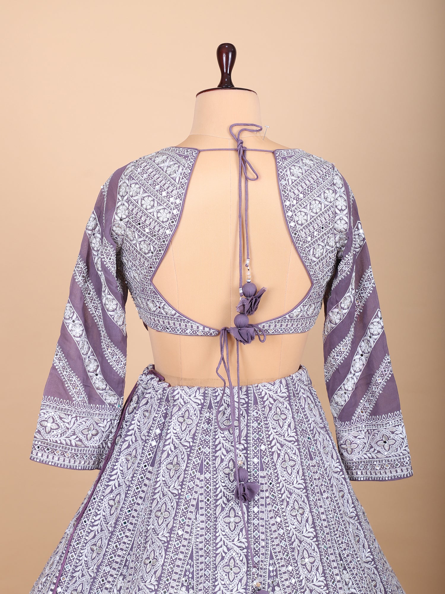 Graceful Lavender Lehenga With Intricate Thread Handwork