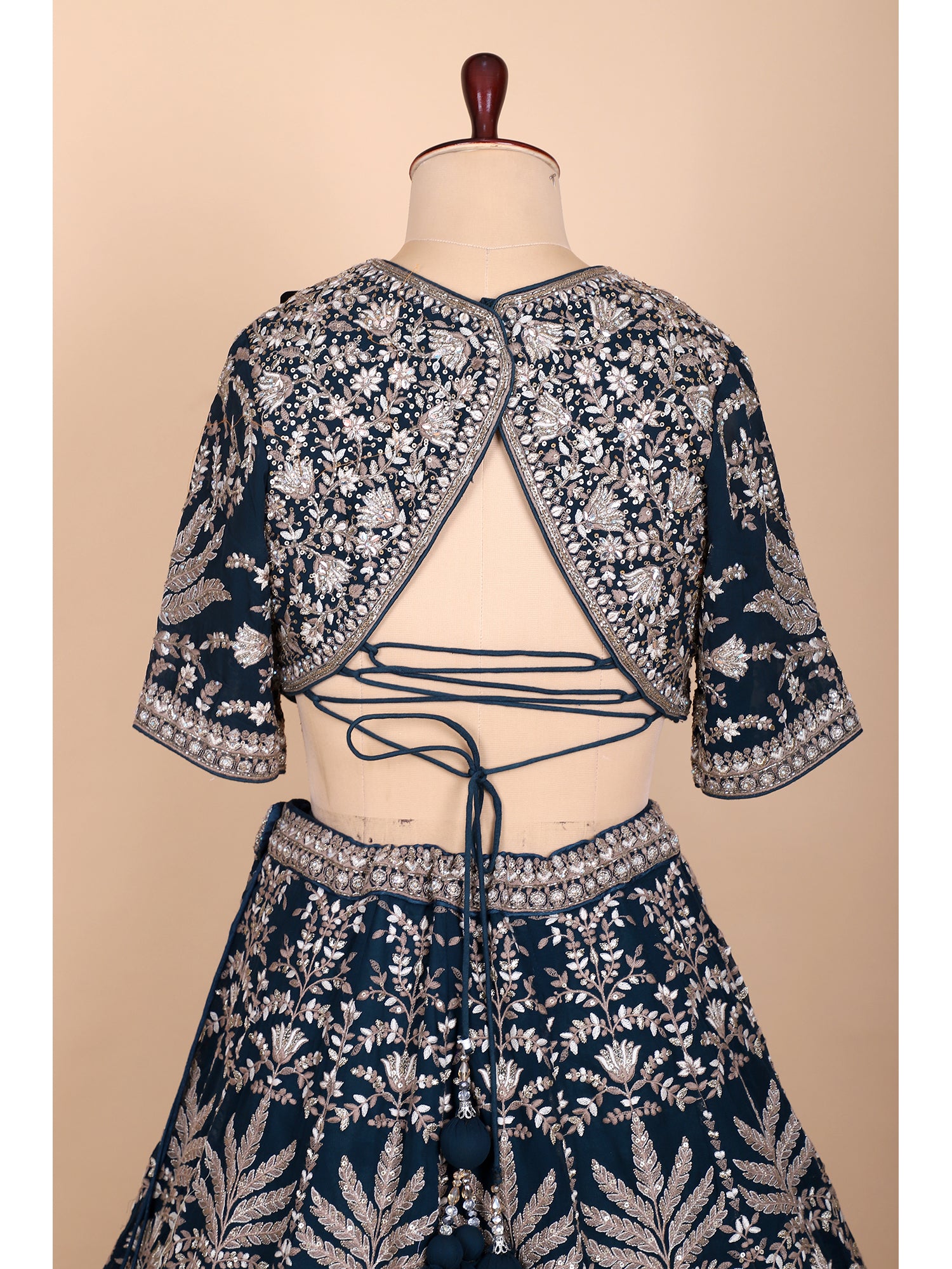 Dark Green Party Wear Lehenga With Jarkan Detailing