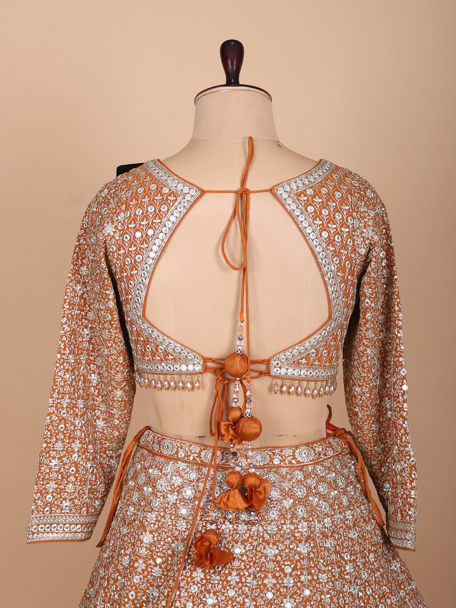 Handcrafted Orange Lehenga For Festive Occasions