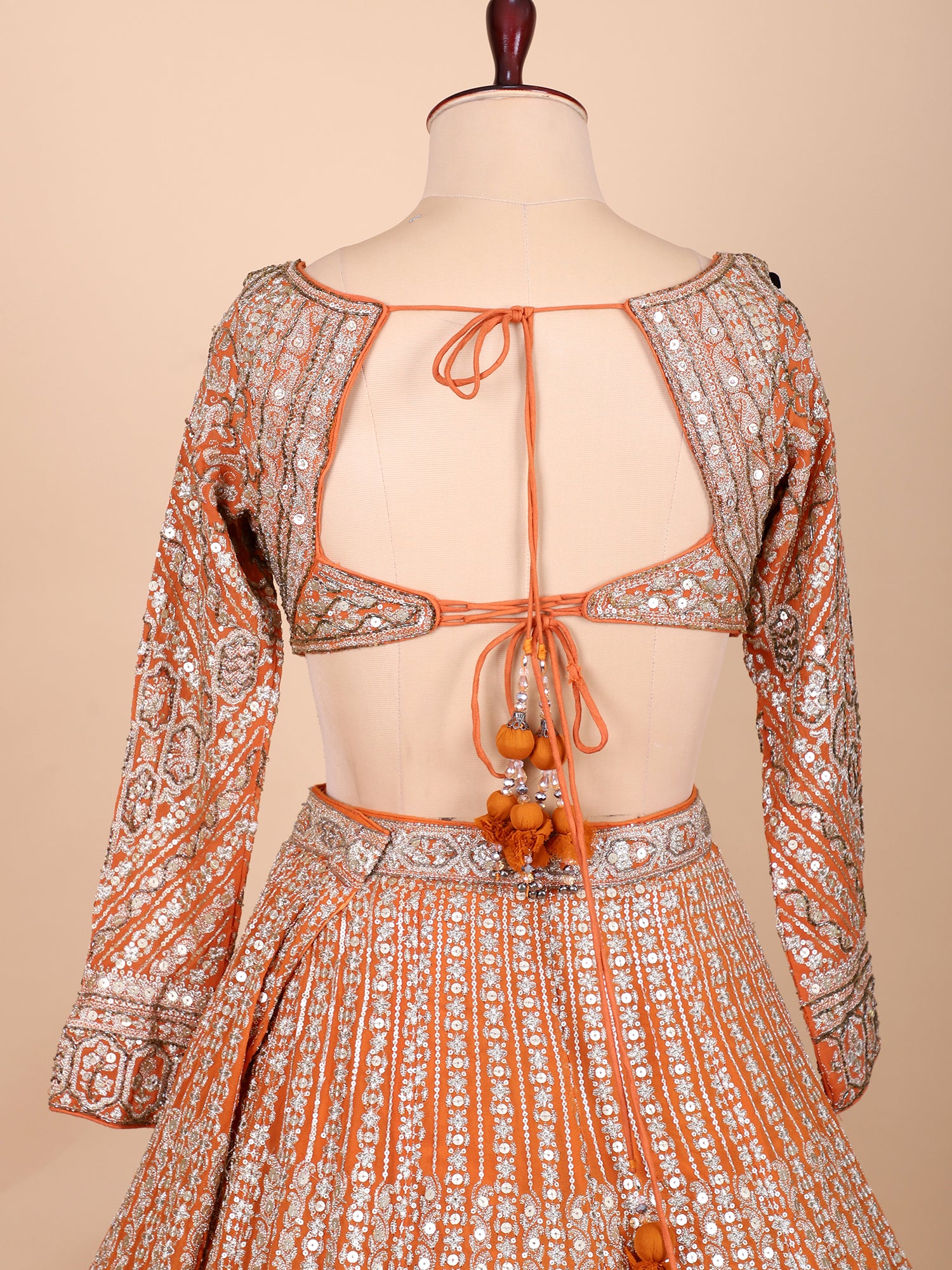 Bright Orange Handcrafted Lehenga Ensemble
