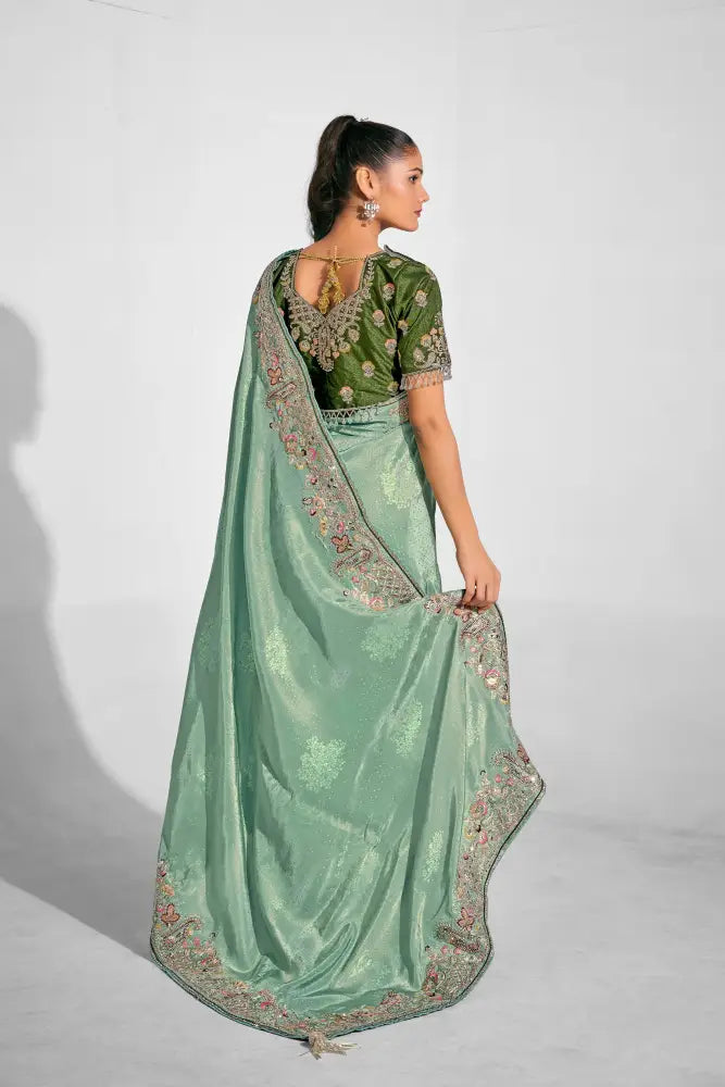 A Classic Pista Net Saree Made For Grand Occasions Saree