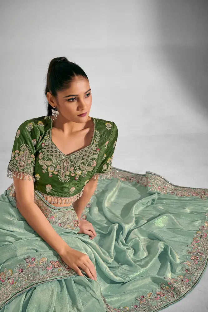 A Classic Pista Net Saree Made For Grand Occasions Saree