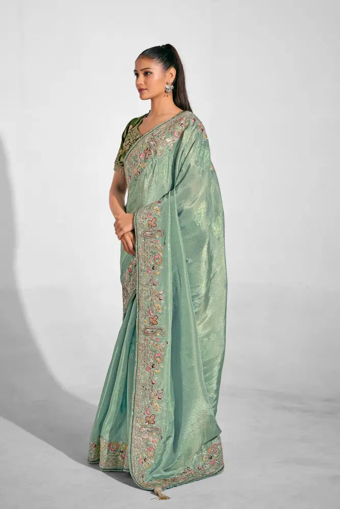 A Classic Pista Net Saree Made For Grand Occasions Saree