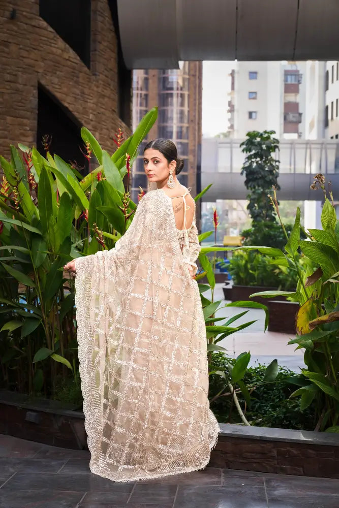 Elegant Champagne Gold Net Saree With Stonework And Sequence Work Readymade Designer Blouse Included