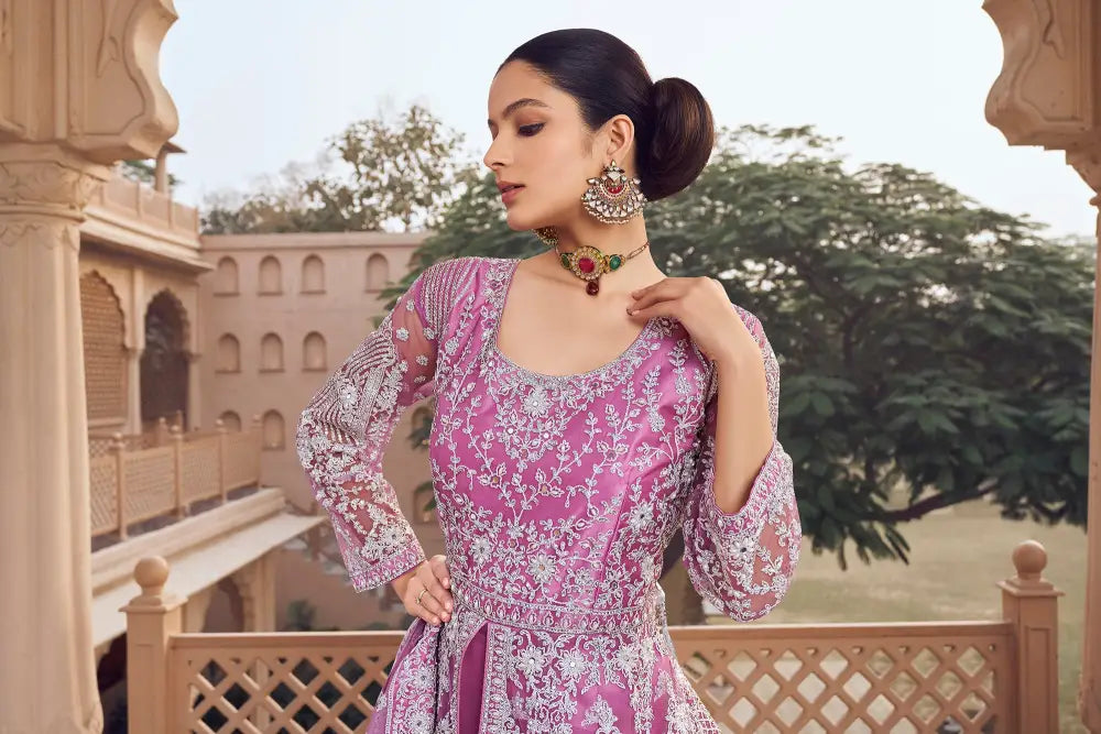 Eye-Catching Pink Net Saree With Sequins And Thread Detailing Saree