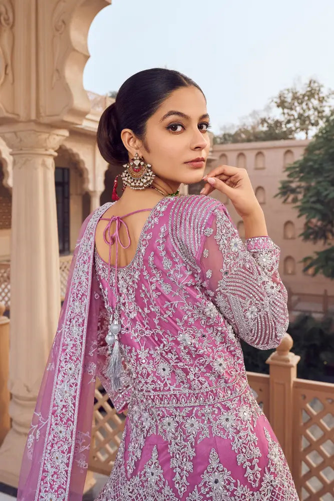 Eye-Catching Pink Net Saree With Sequins And Thread Detailing Saree