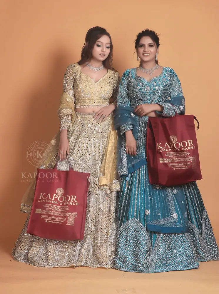 Golden Net Lehenga With Stone Work And Hand-Touch Detailing