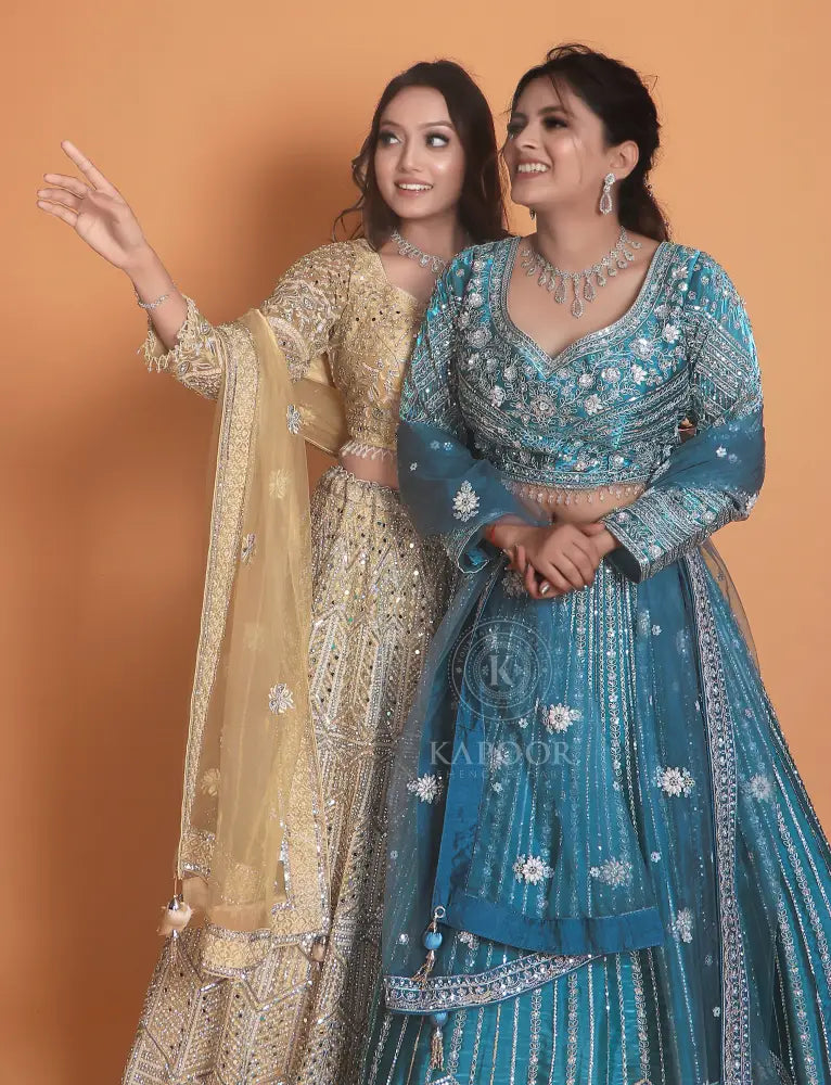 Golden Net Lehenga With Stone Work And Hand-Touch Detailing