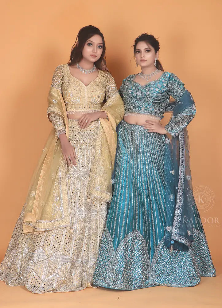 Golden Net Lehenga With Stone Work And Hand-Touch Detailing