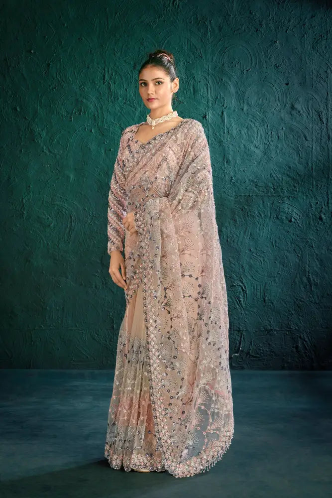 Light Up The Room In This Radiant Pink Net Saree With Stonework Saree