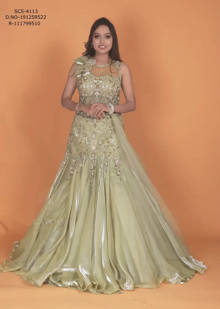 Opulent Pista Green Gown With Jimmy Choo Fabric And Stone Embellishments