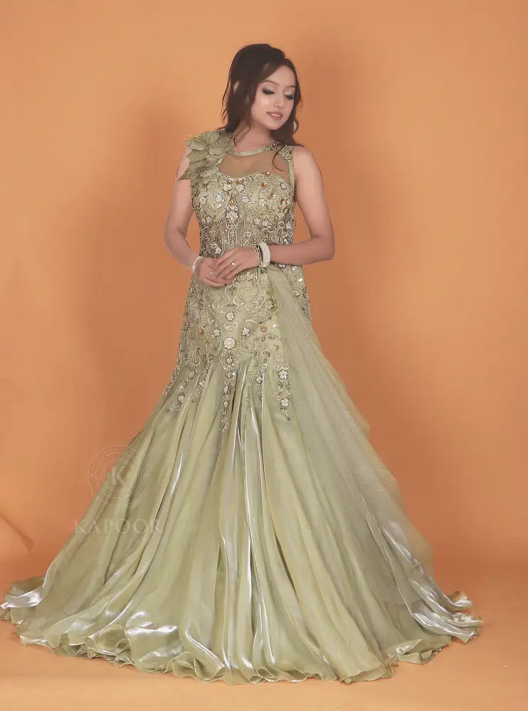 Opulent Pista Green Gown With Jimmy Choo Fabric And Stone Embellishments
