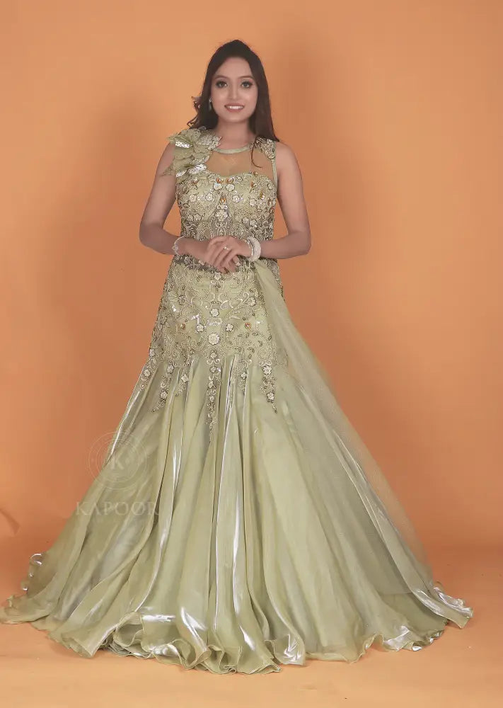 Opulent Pista Green Gown With Jimmy Choo Fabric And Stone Embellishments