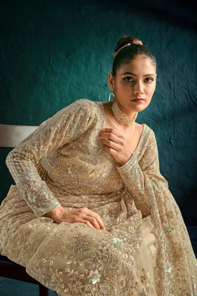 Premium Net Saree In Golden With Intricate Hand-Stitched Stones Saree