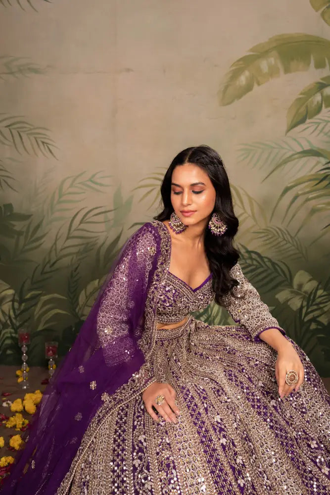 Purple Net Lehenga With Dupatta Featuring Intricate Mirror Jarkan Lehenga