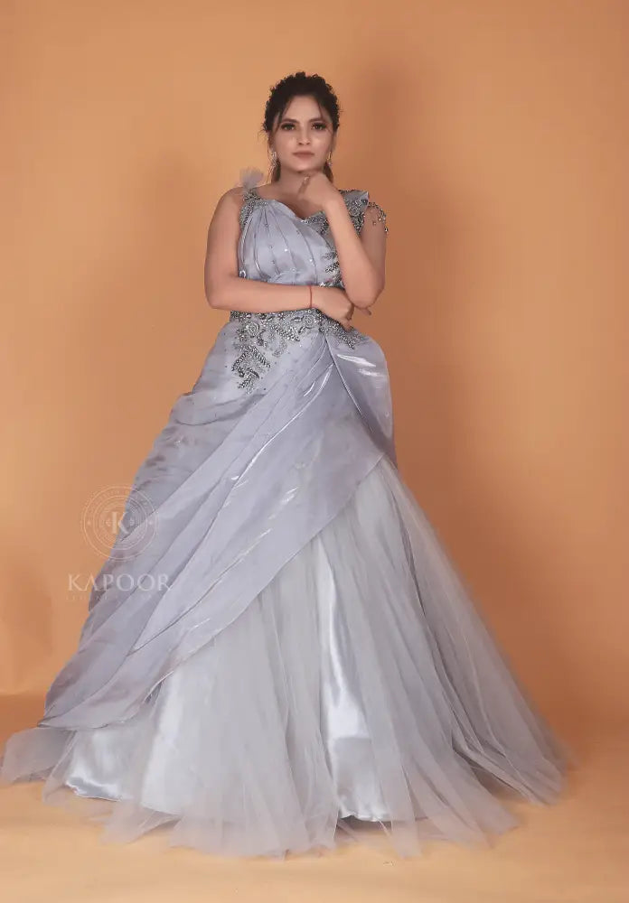 Silver Designer Gown With Handwork And Stone Detailing In Net Fabric