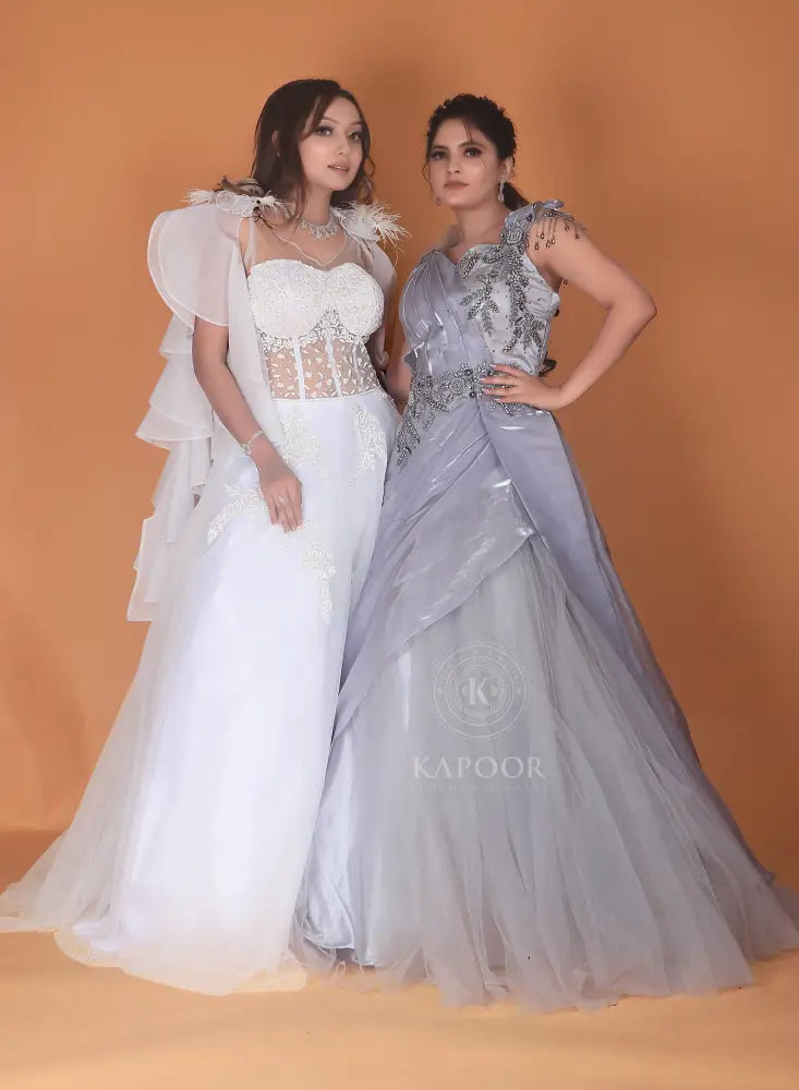 Silver Designer Gown With Handwork And Stone Detailing In Net Fabric