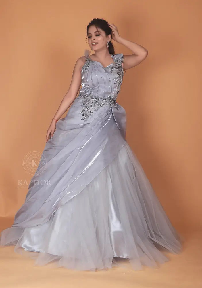 Silver Designer Gown With Handwork And Stone Detailing In Net Fabric