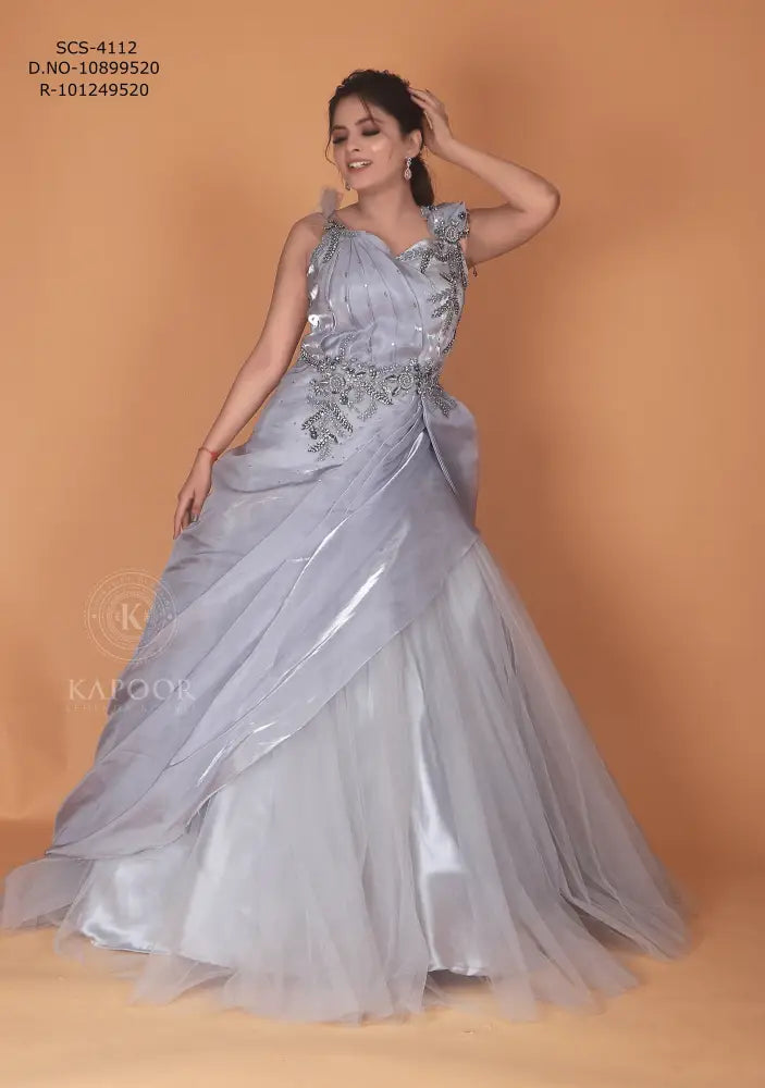 Silver Designer Gown With Handwork And Stone Detailing In Net Fabric