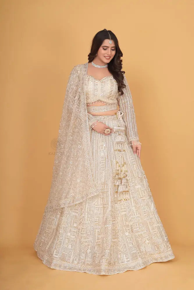 White Bollywood Inspired Net Lehenga With Hand-Pal Work Sequence And Jarkan Details