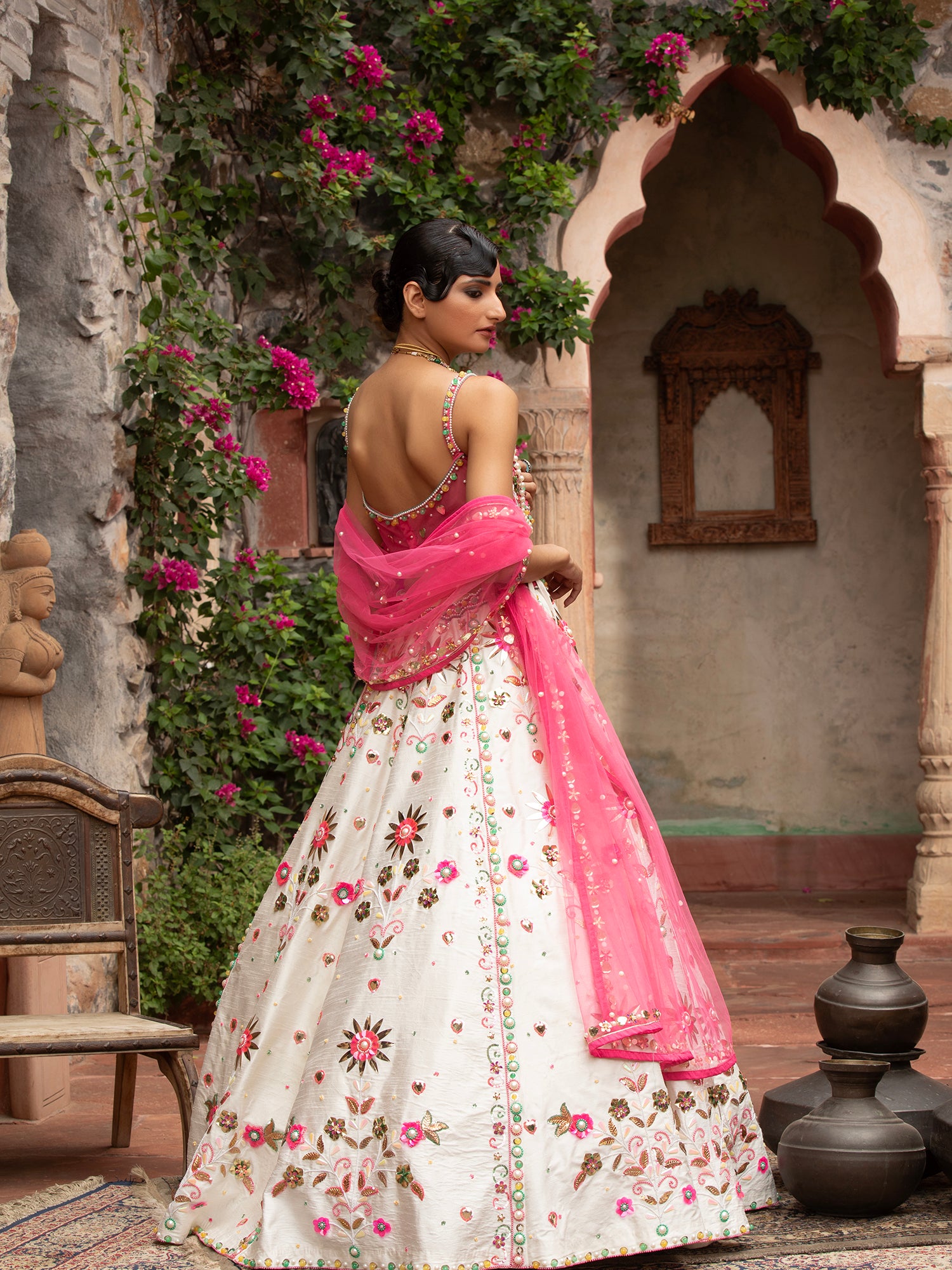 White Silk Lehenga With Handcrafted Detailing