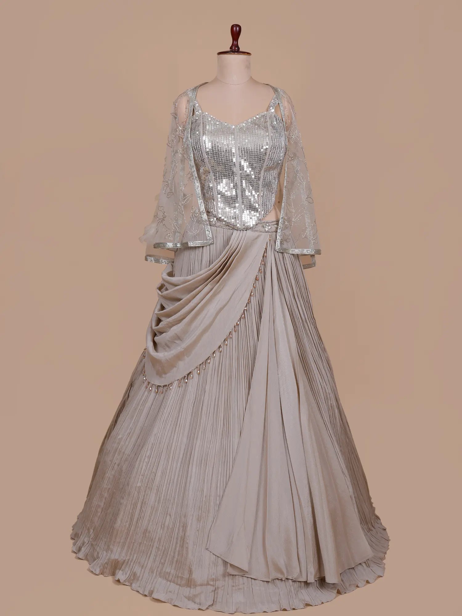 Buy Grand Champagne Chinon Lehenga Featuring Signature Sparkle