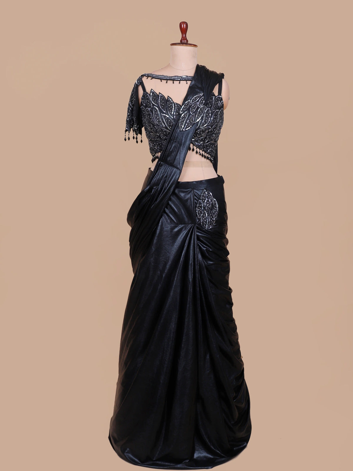 Dazzling Black Pre Draped Saree Featuring Sheer Neck and Sequin Leaf Blouse
