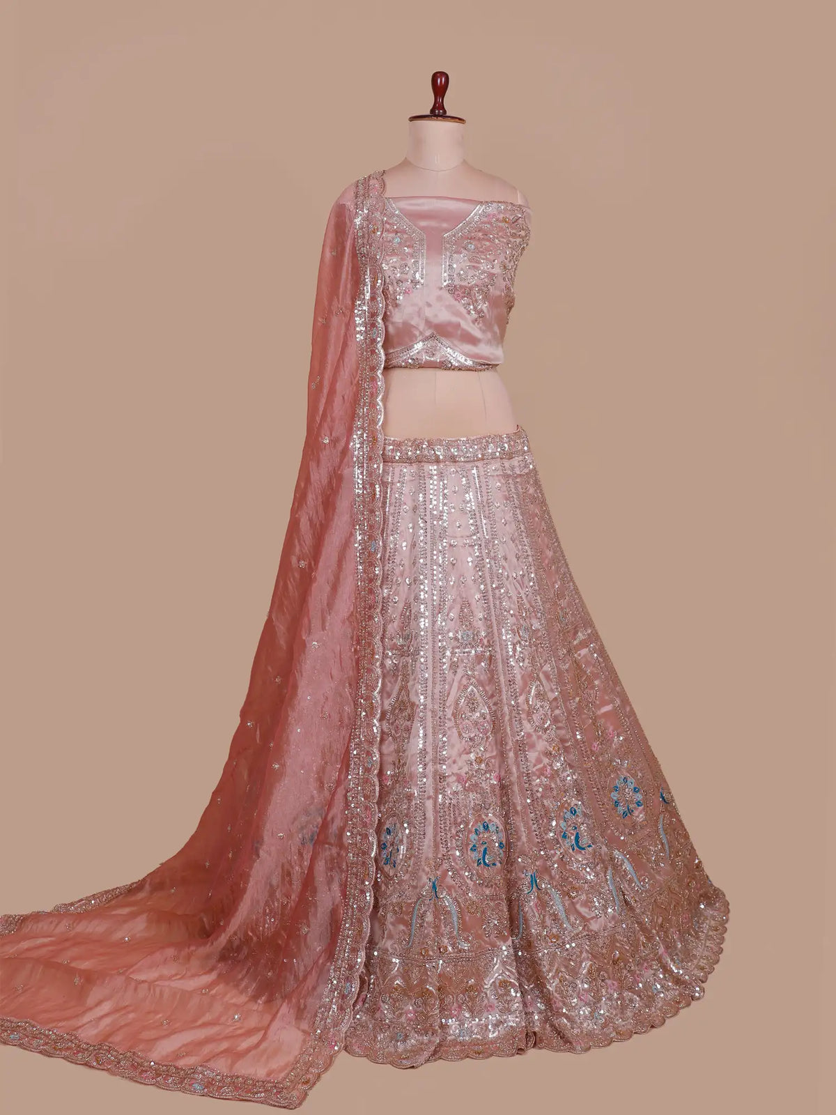 Blush Pink Silk Designer Lehenga Showcasing Peacock and Sequin Embroidery