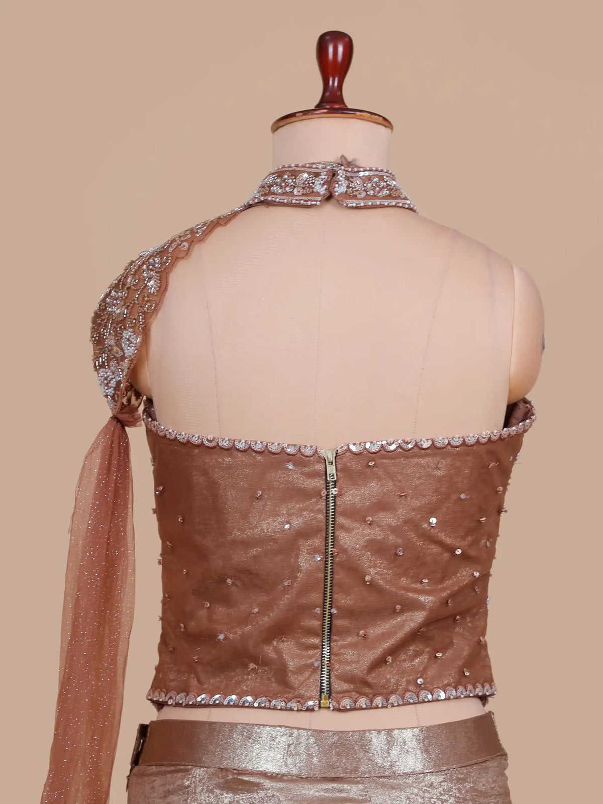 Glamorous Metallic Bronze Imported Pre Drape Saree with Beaded Corset Blouse