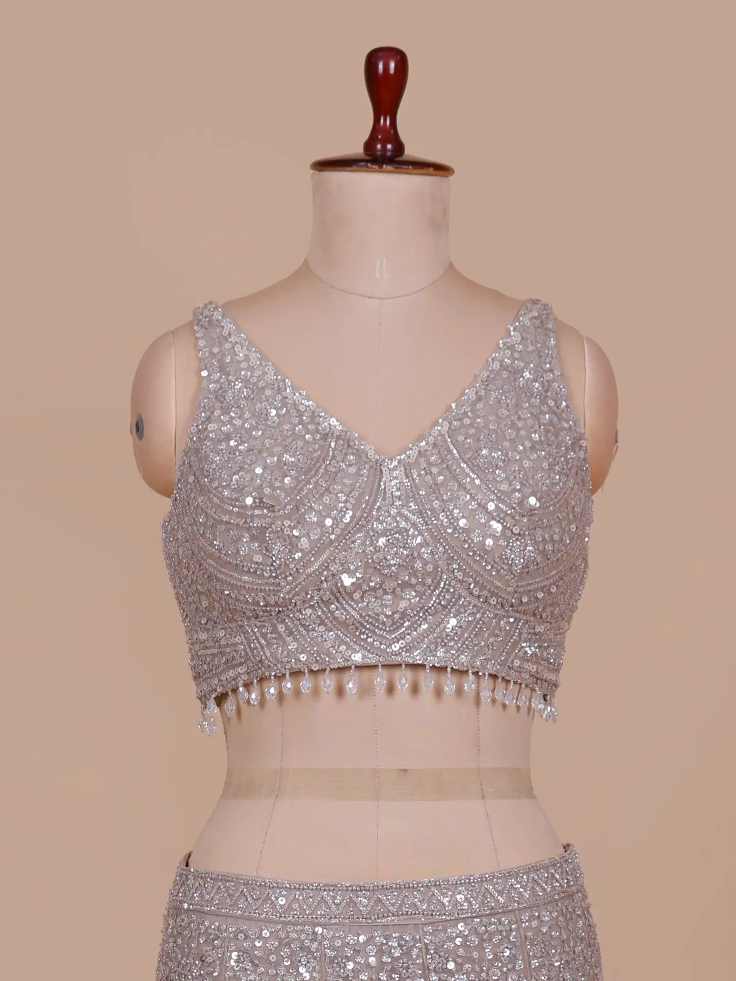 Exclusive Champagne Mermaid Lehenga Choli Adorned With Pearl Moti Work