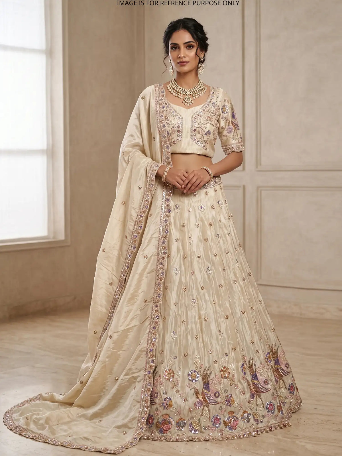 Champagne Gold Shimmer Organza Lehenga Featuring Colorful Bird Motifs