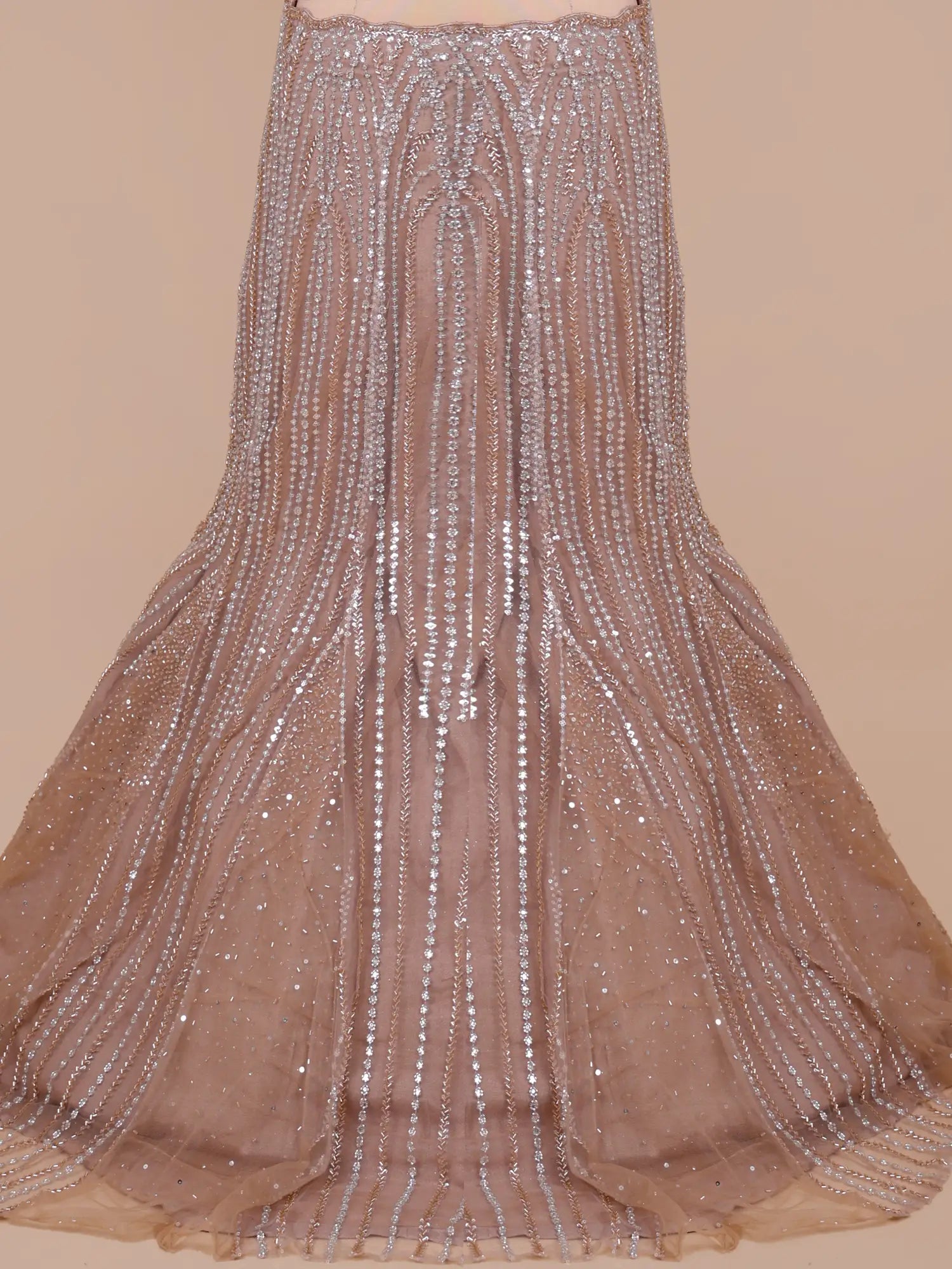 Premium Chickoo Net Designer Mermaid Lehenga Enhanced With Crystal Work