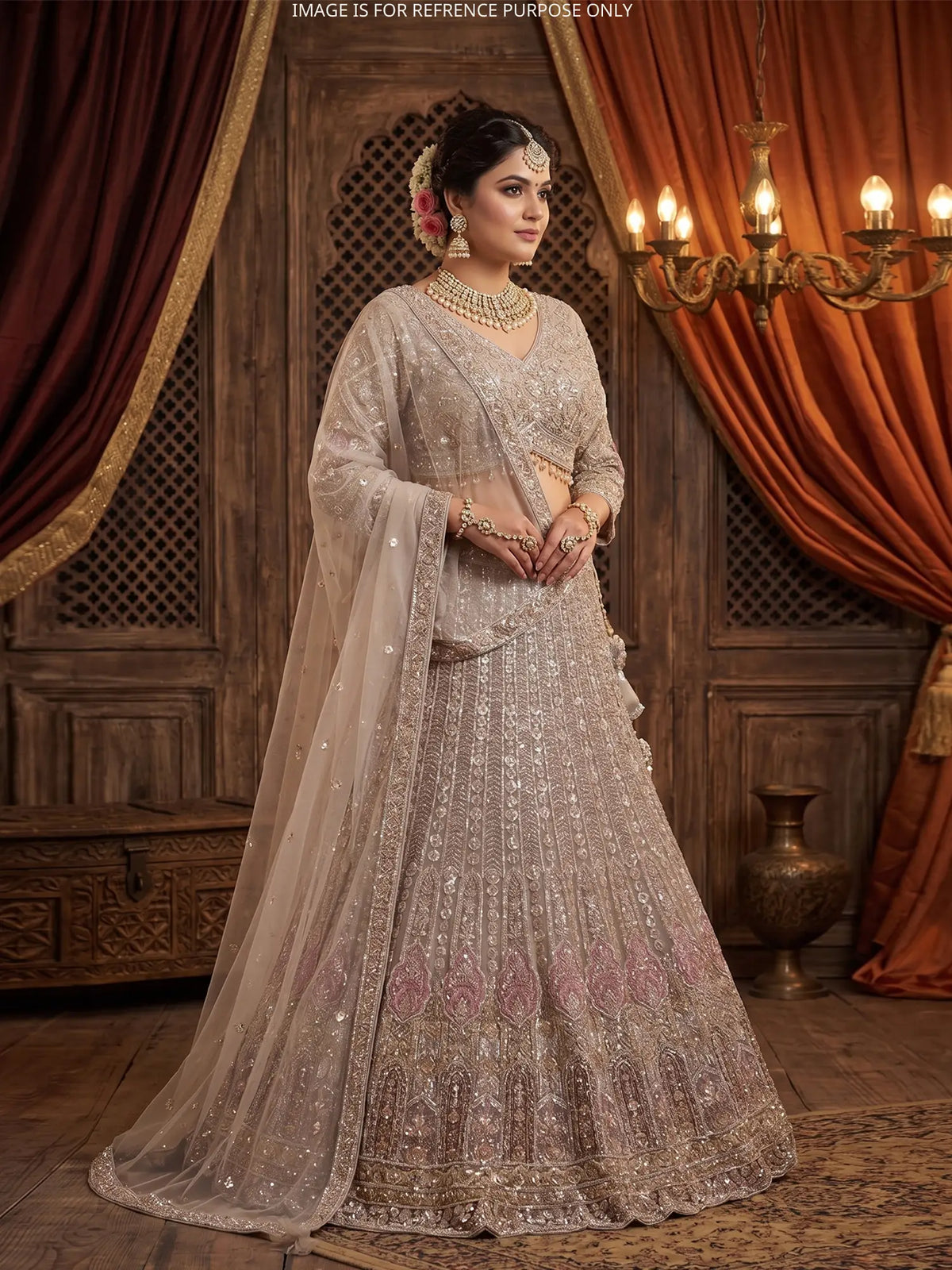 Chickoo Net Couture Lehenga Choli with Applique Embellishment