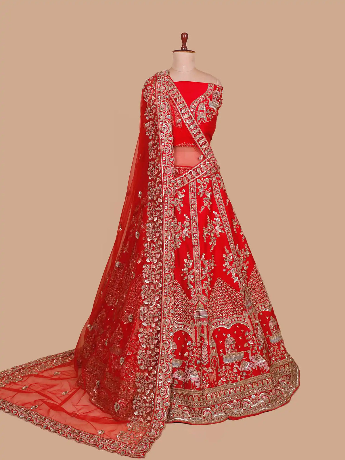 Crimson Red Silk Bridal Lehenga Featuring Architectural and Wildlife Designs