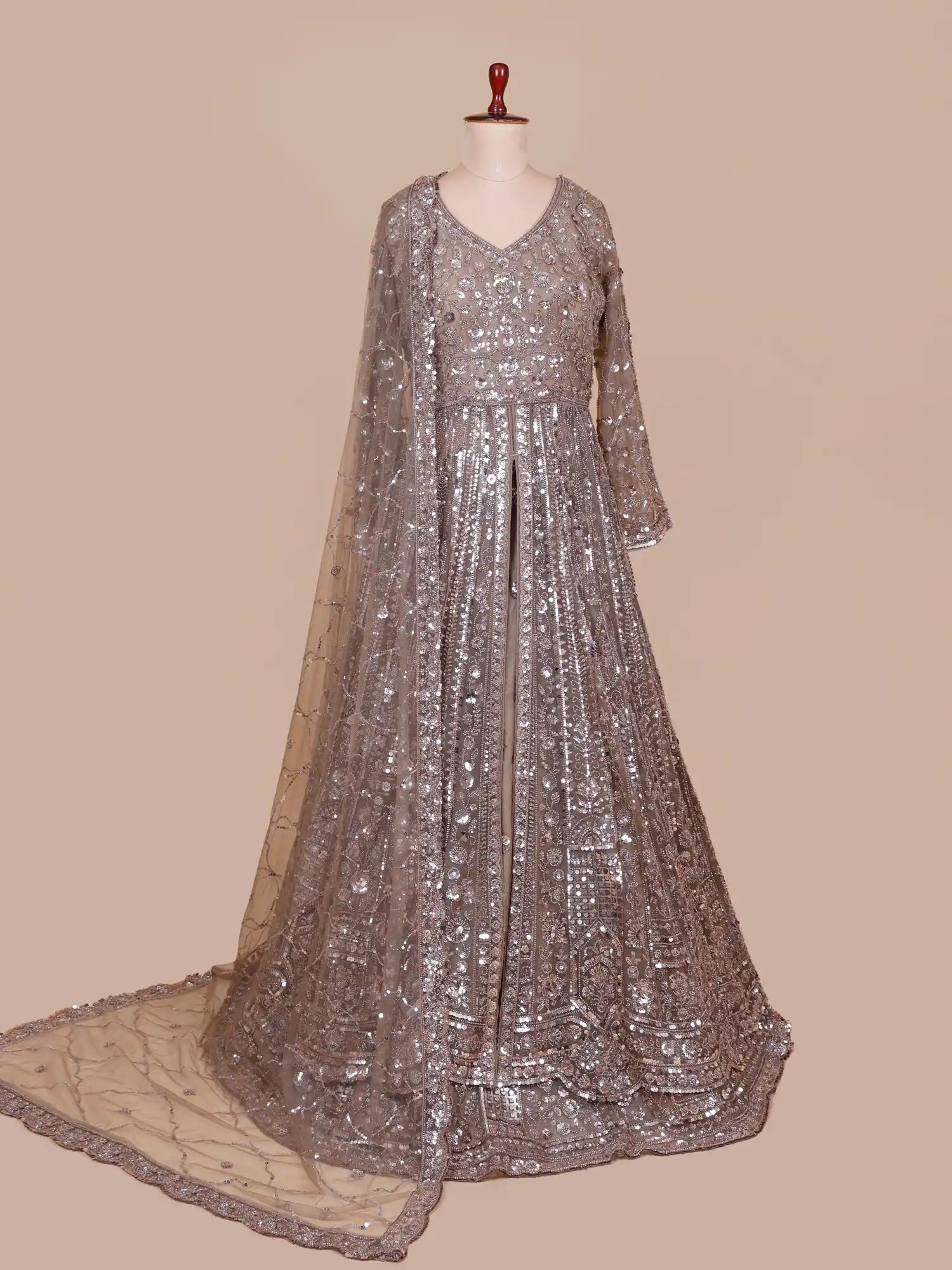 Unveil Dark Copper Designer Net Long Lehenga With Center Cut Design