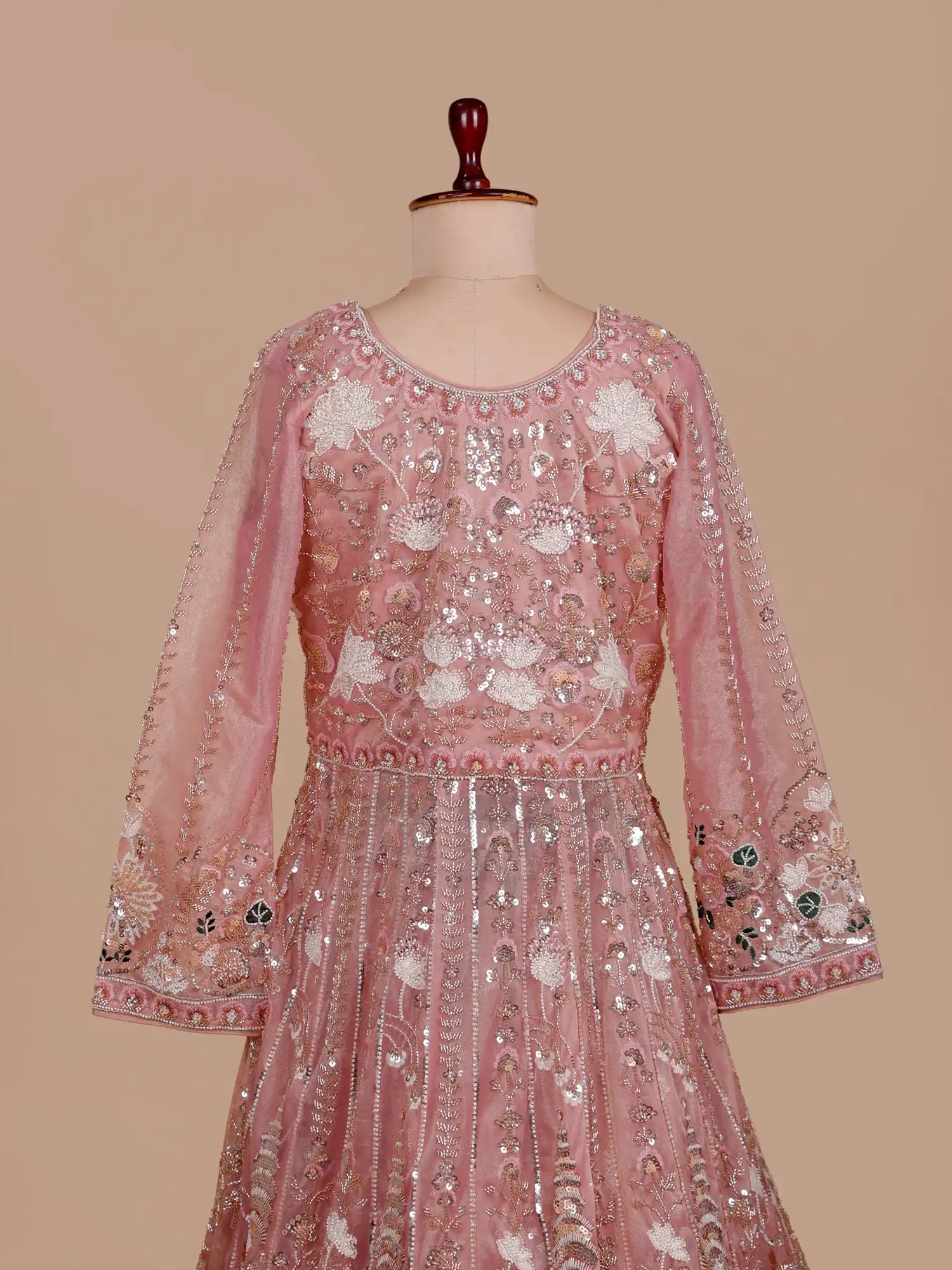 Get Beautiful Dark Peach Organza Long Lehenga With Center Cut Design