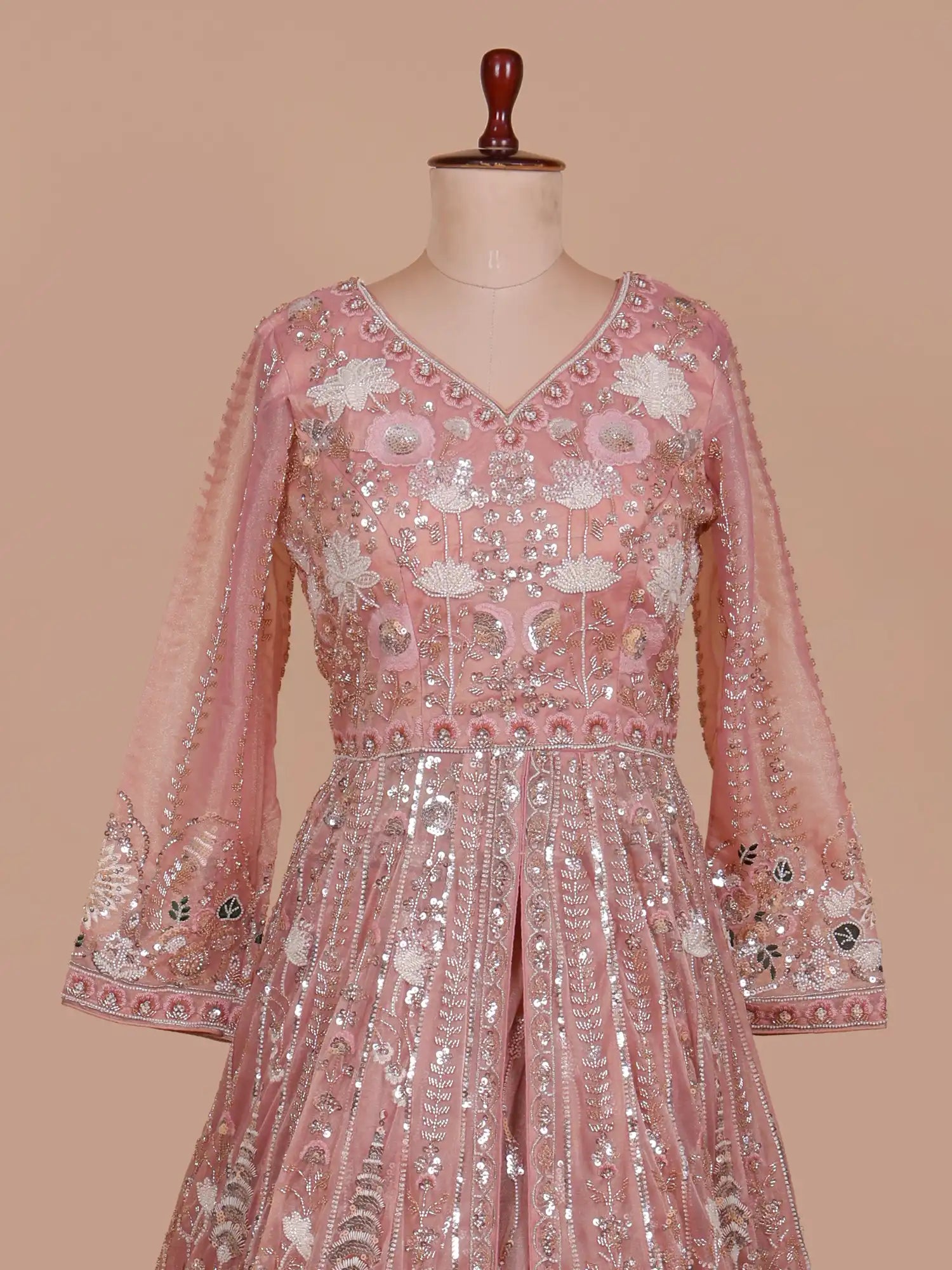 Get Beautiful Dark Peach Organza Long Lehenga With Center Cut Design