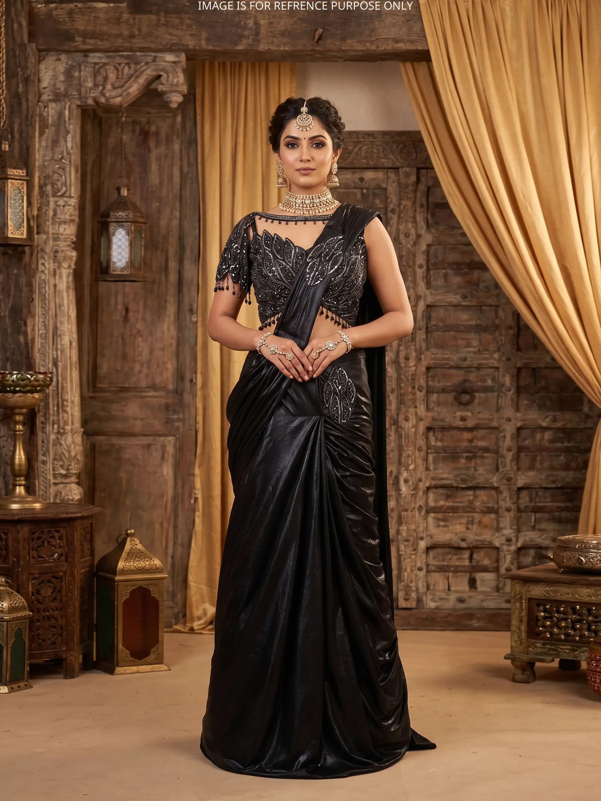 Dazzling Black Pre Draped Saree Featuring Sheer Neck and Sequin Leaf Blouse