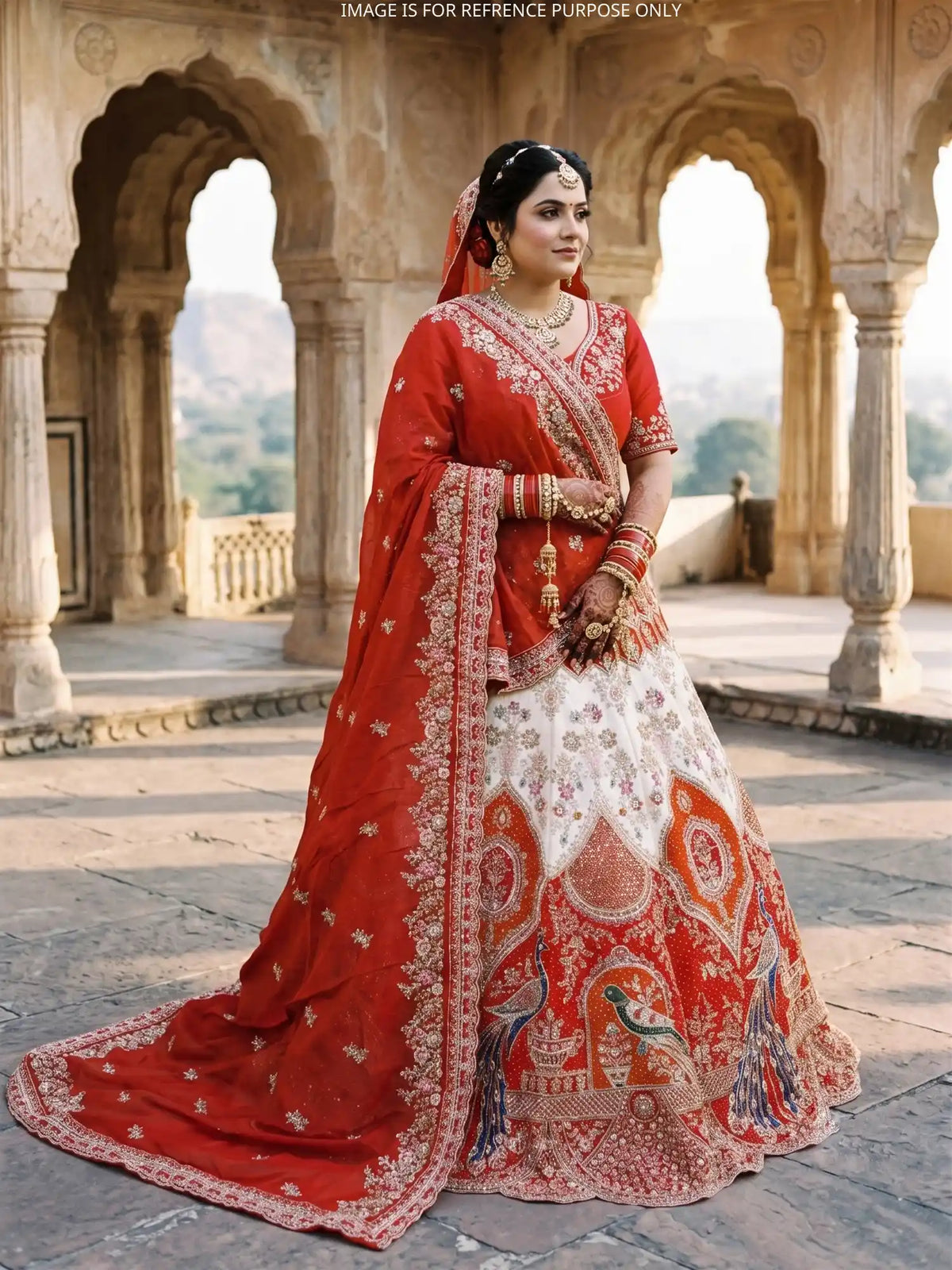 Discover Unique Red Bridal Lehenga Featuring Two-Tone Peacock Embroidery