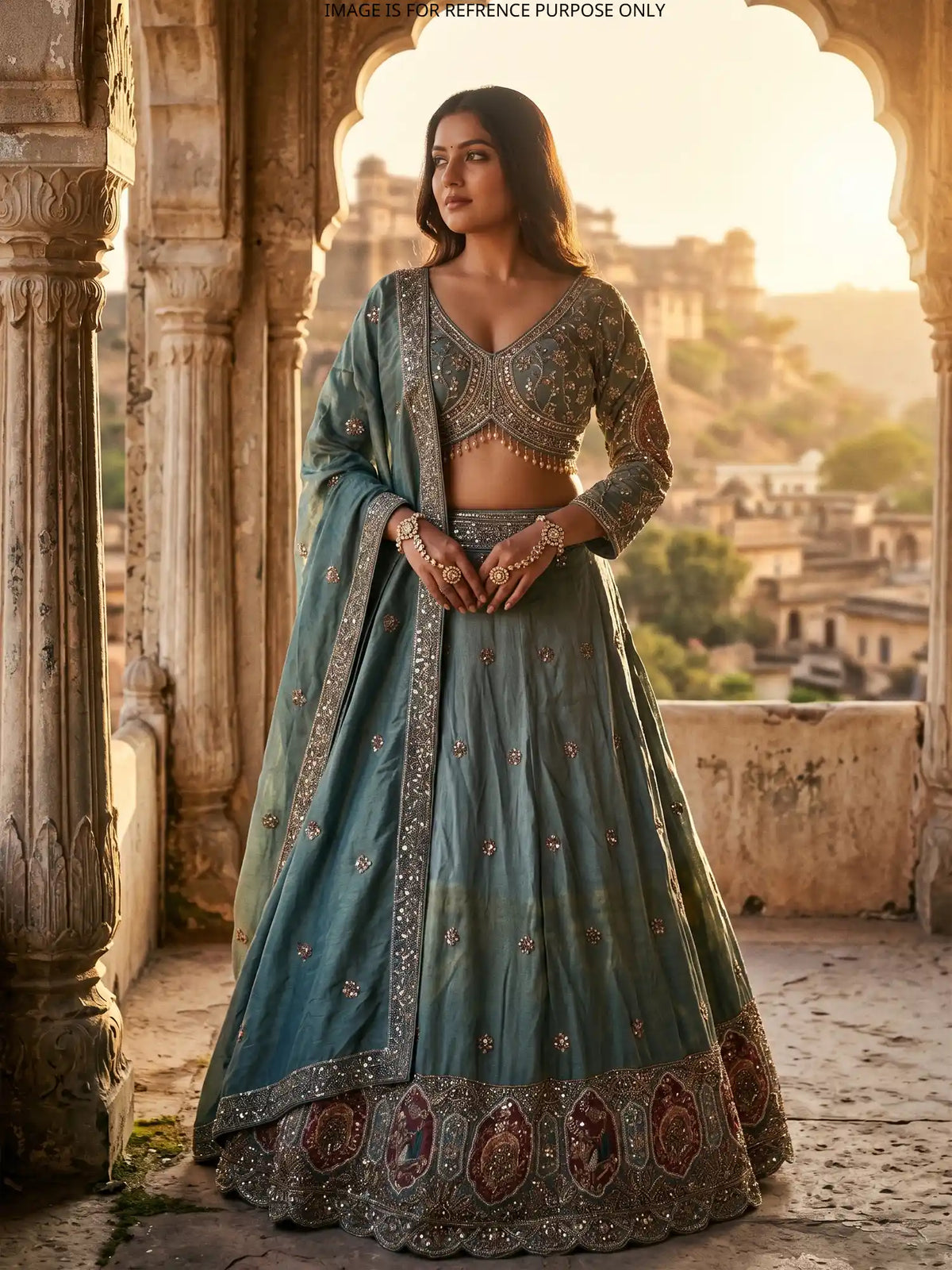 Dual Tone Teal Lehenga Featuring Ornate Bird Embroidery