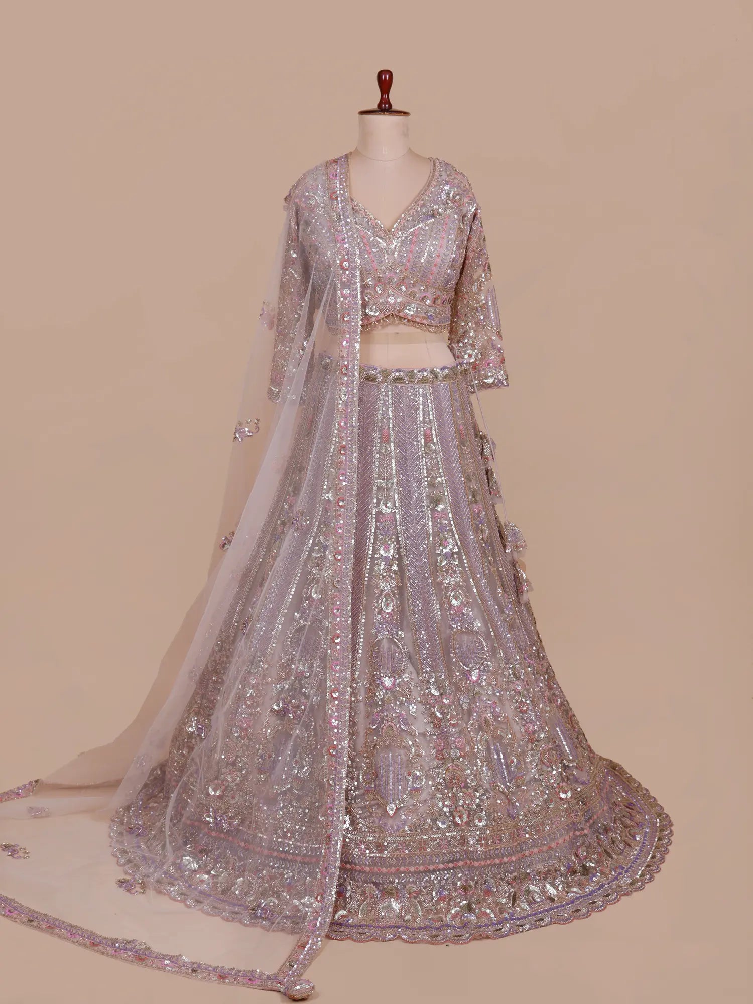 Get Dusty Orchid Net Lehenga Choli Online Showcasing Resham Moti Cut Dana Craft