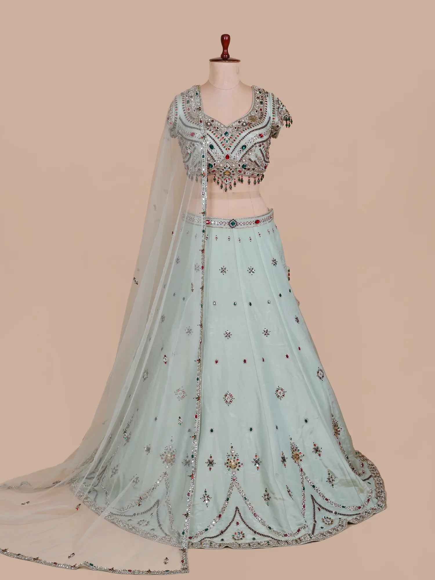 Shop Pista Green Shimmer Silk Lehenga Online With Crystal Brooch Detailing