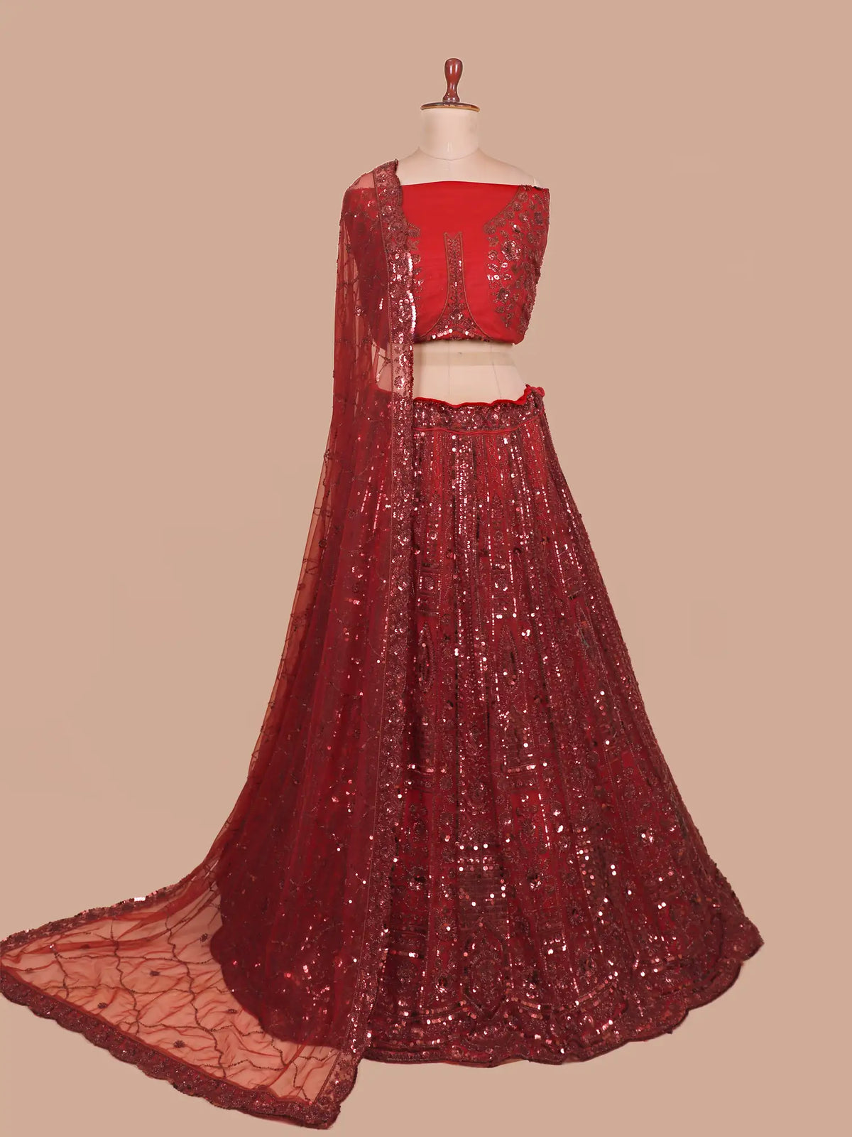 Maroon Silk Net Lehenga Featuring Heavy Sequin Panel Work