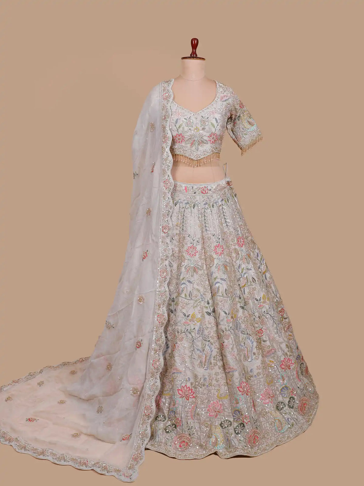 Charming Off White Lehenga with Bird and Pastel Floral Embroidery