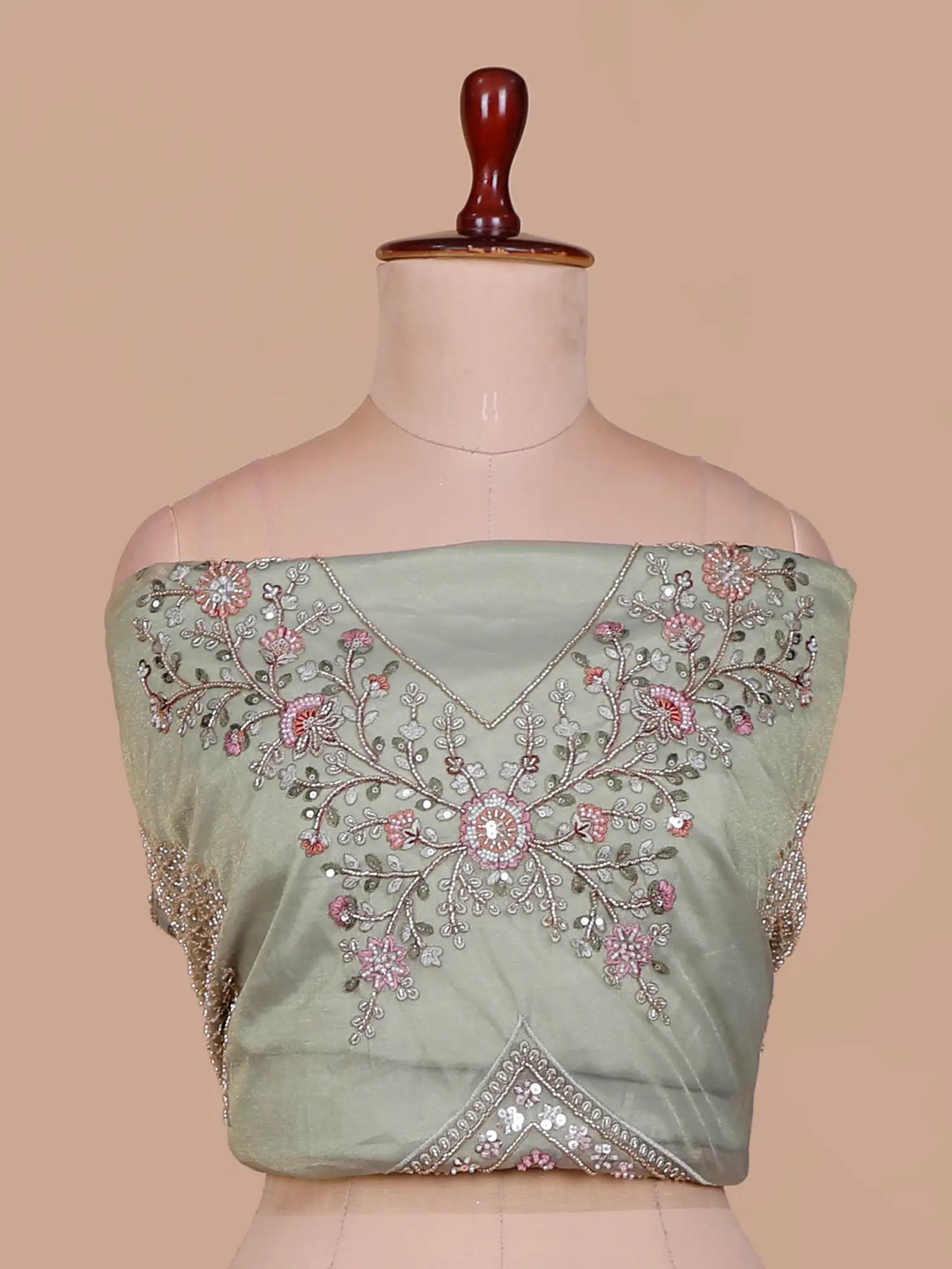 Elegant Pista Green Lehenga with Pink Floral and Navy Peacock Motifs